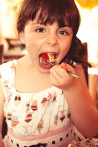 Party Girl munches cake Party Girl munches cake